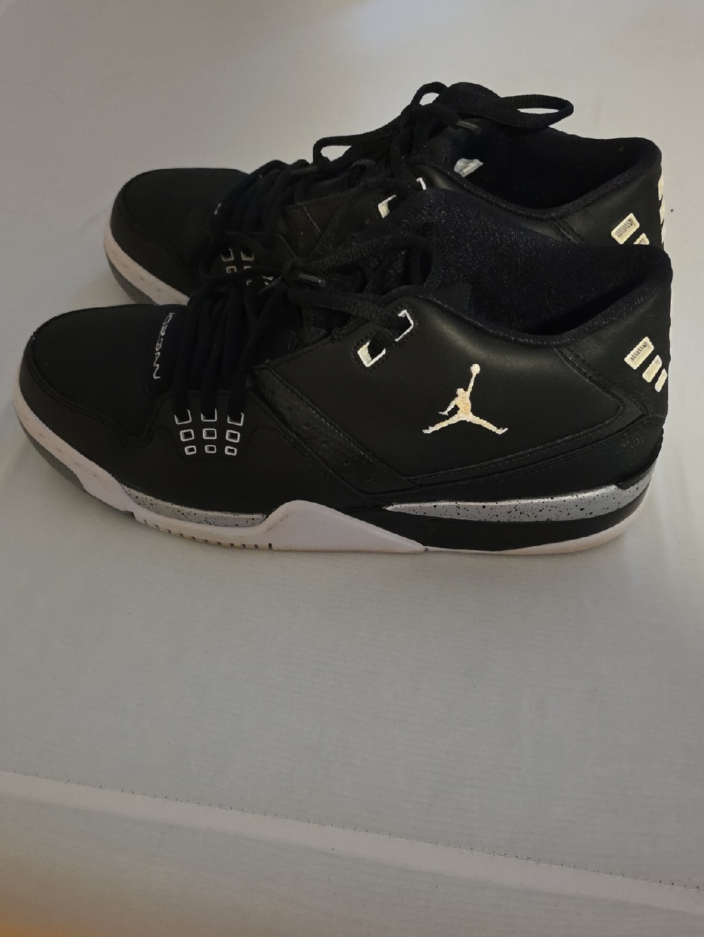 Jordan Black and White Low-Top Basketball Sneakers